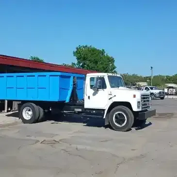 Truck Picking Up the Garbage — Bradenton, FL — Flying Dutchman Dumpsters