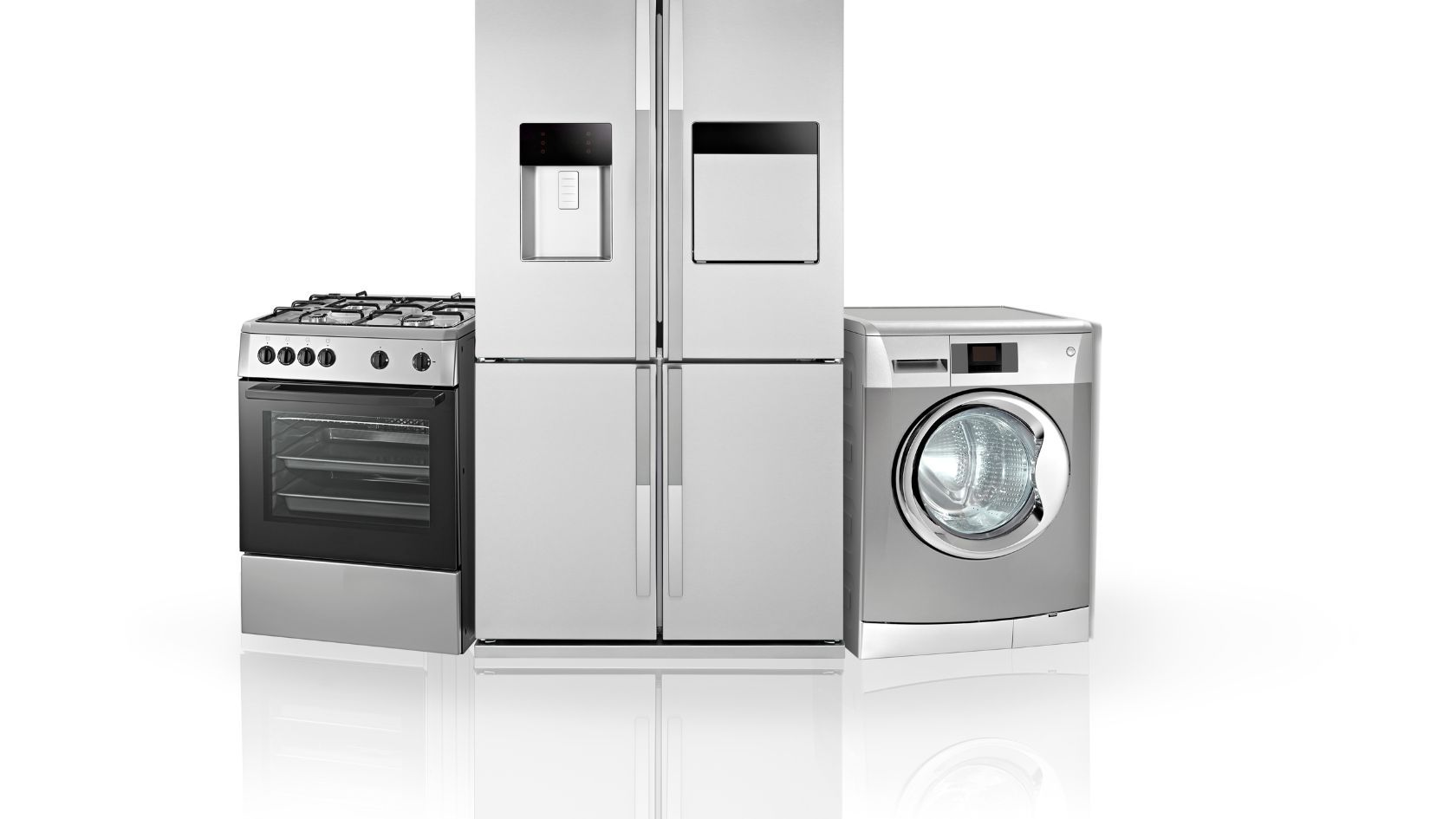 Silver kitchen appliances: stove, refrigerator, and washing machine.