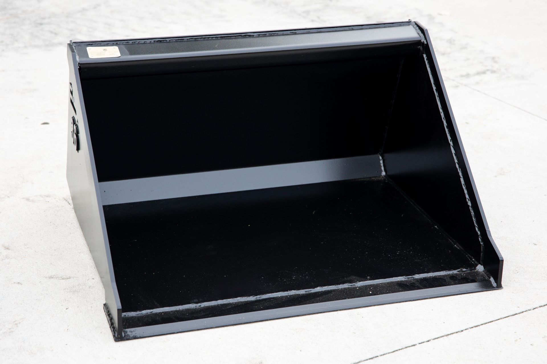 A black bucket with the number 36 on it