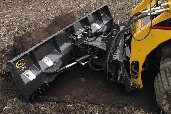 A black snow plow on a white background.