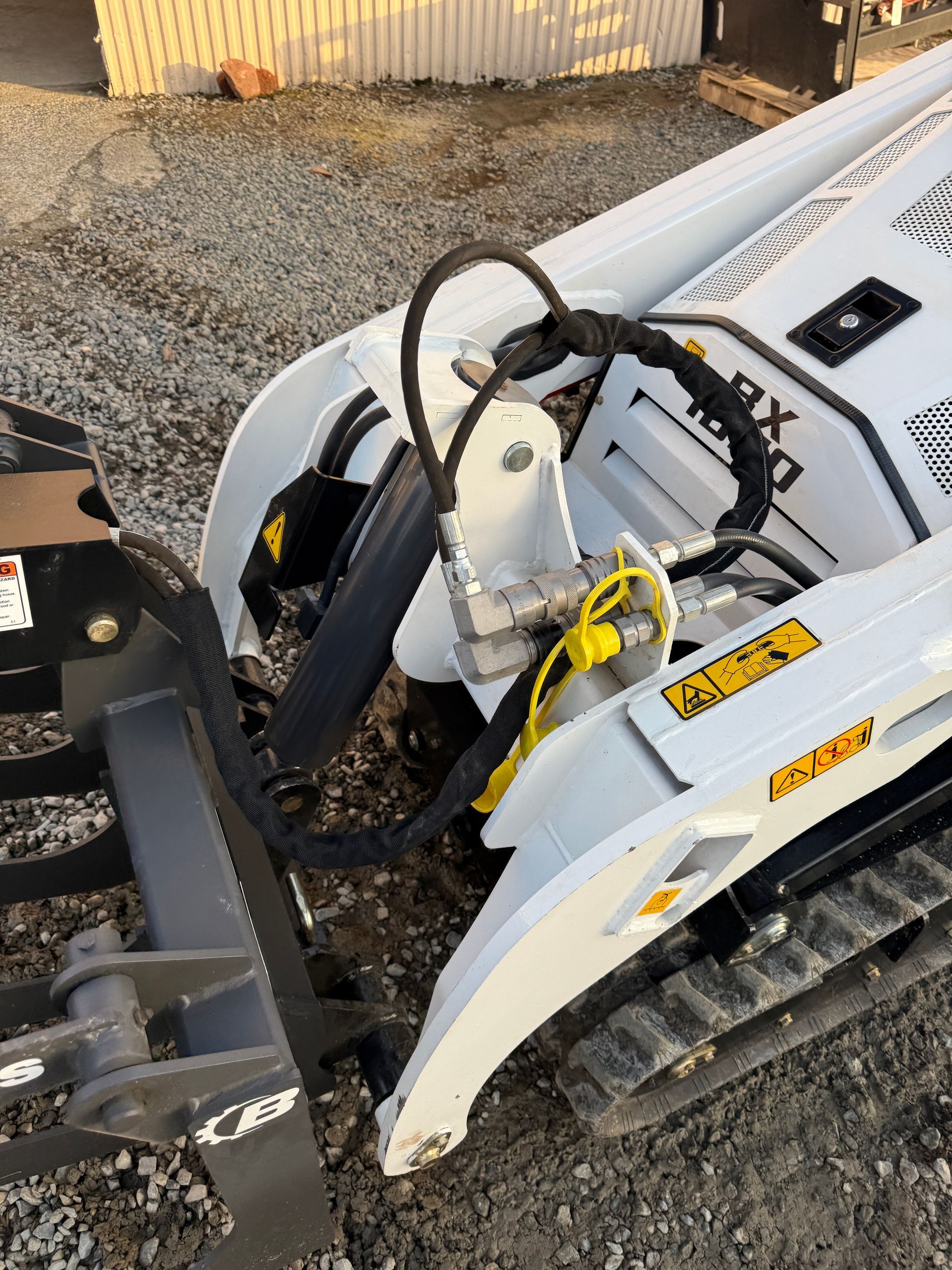 BX1000 Mini Skid Steer w/ Grapple #2375
