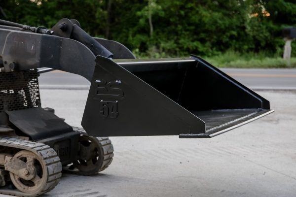 A black bucket with the letters fc on it