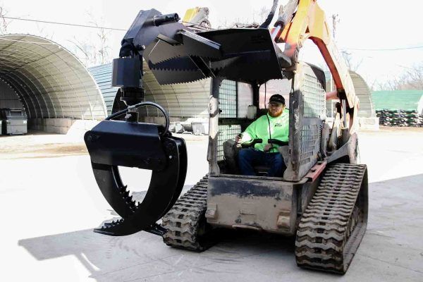 A close up of a black object on a white background