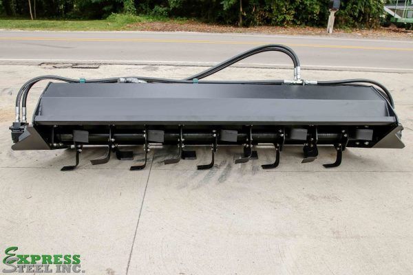 An express steel inc. logo is on the side of a concrete surface