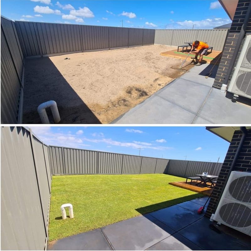 A semi truck is carrying a large excavator on a trailer.