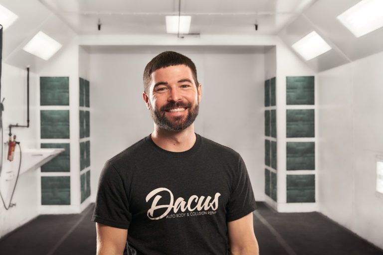 Smiling man in a black 