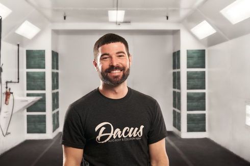 Smiling man in a black 