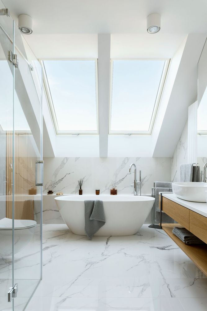 Bright white bathroom with skylights