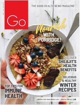 A person is holding a bowl of porridge on the cover of a magazine.