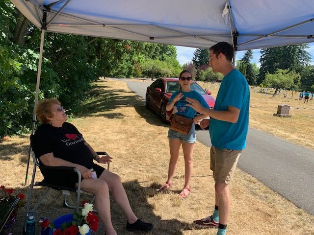 Kyle Kocsis's Grandmother and racers by his bench in Bayview Cemetery Bellingham WA