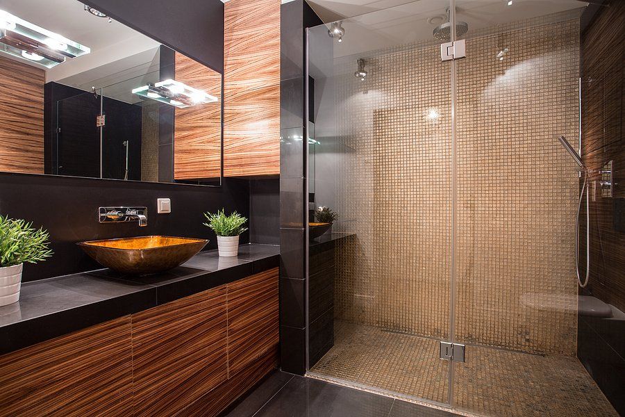 bathroom with shower and glass door