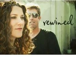 Woman with curly hair and man in sunglasses, text