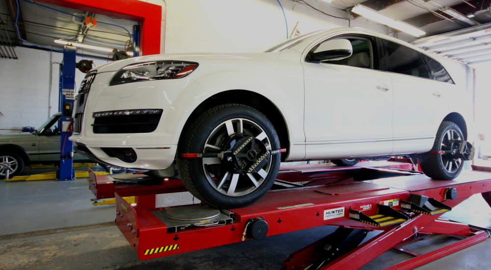 White Car on Lift | BG Automotive