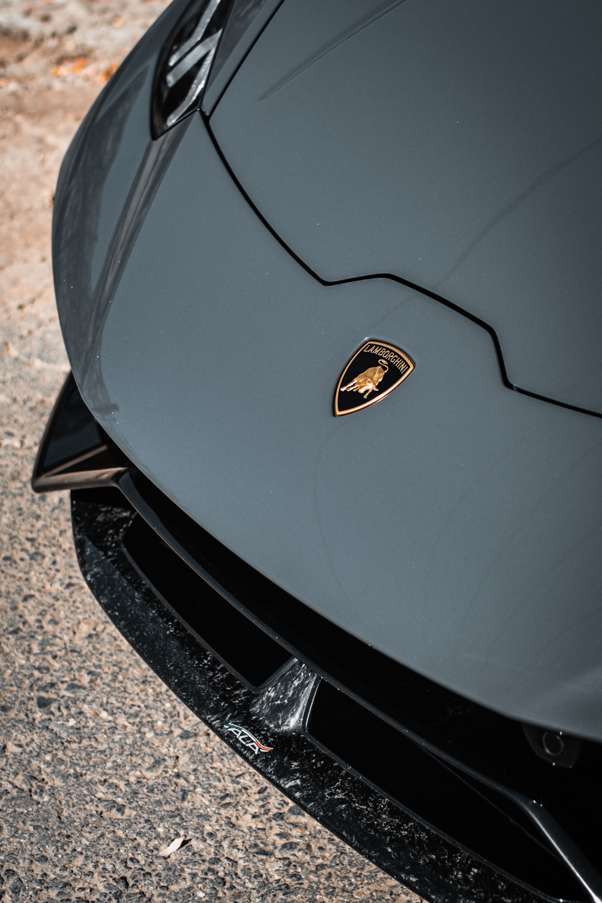 A close up of the front end of a lamborghini huracan.