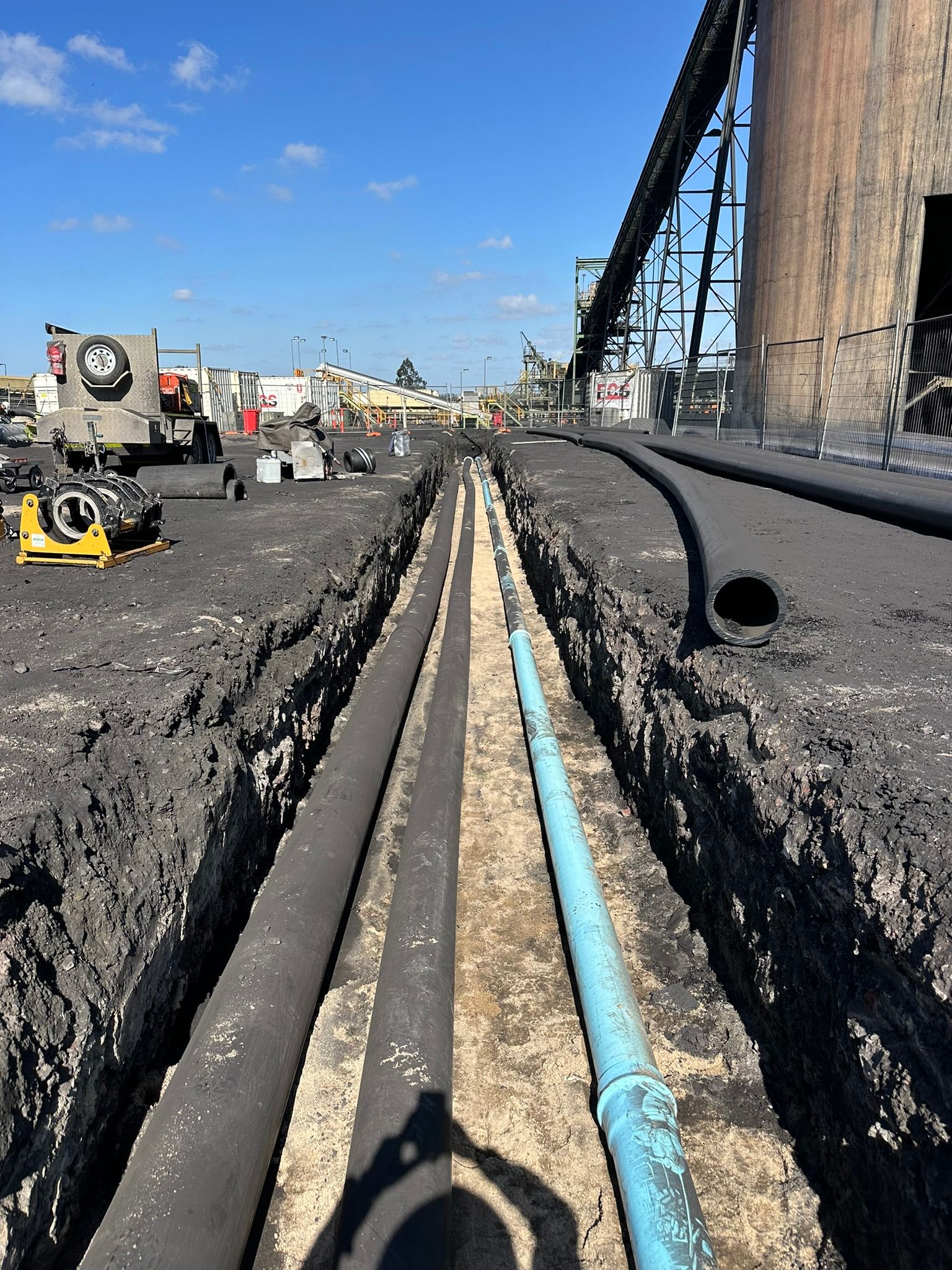 A Plumber is Fixing a Pipe With a Wrench — Precise Plumbing & Excavations Pty Ltd in Bowen, QLD