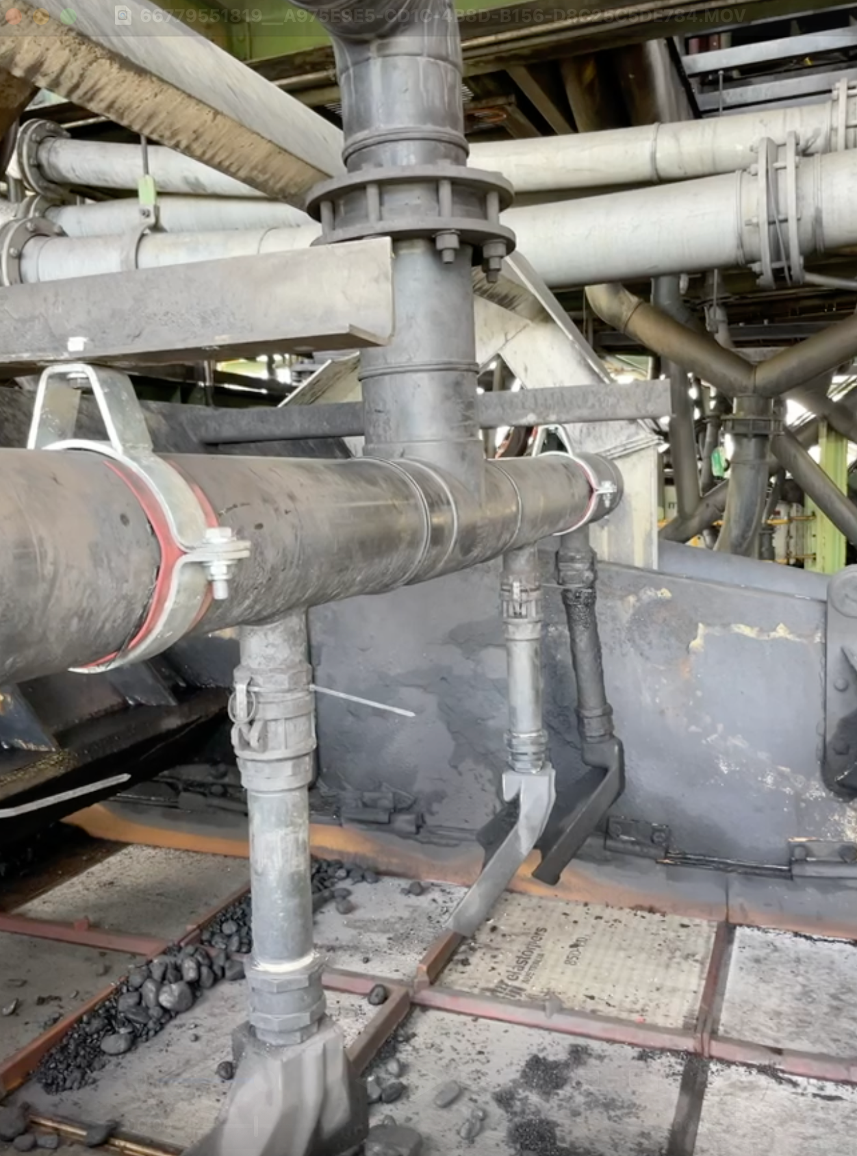 A Man is Fixing a Pipe With a Wrench — Precise Plumbing & Excavations Pty Ltd in Bowen, QLD