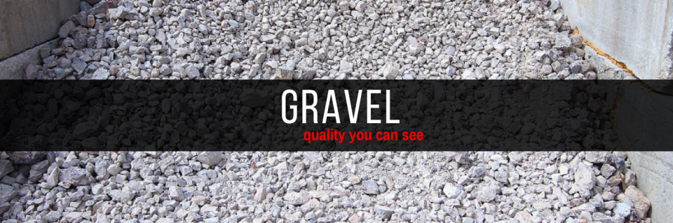 Close-up of gray gravel with a black banner reading “GRAVEL” across the center.