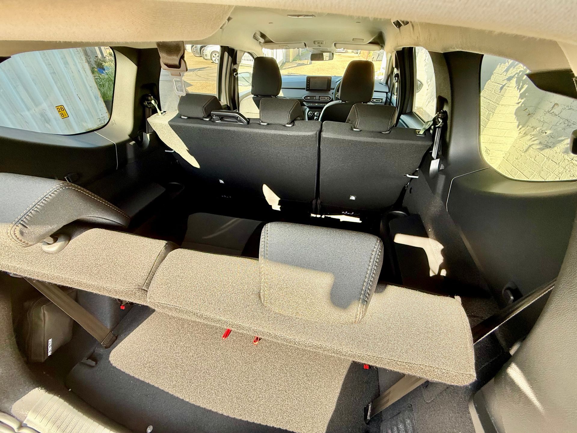 Rent a large car, estate, MPV, 7 seat people carrier, hire a mini-van, people mover, in an automatic transmission with roof rails, travel UK and Europe in the New Dacia Jogger Extreme Hybrid self charging, ULEZ compliant rental vehicle