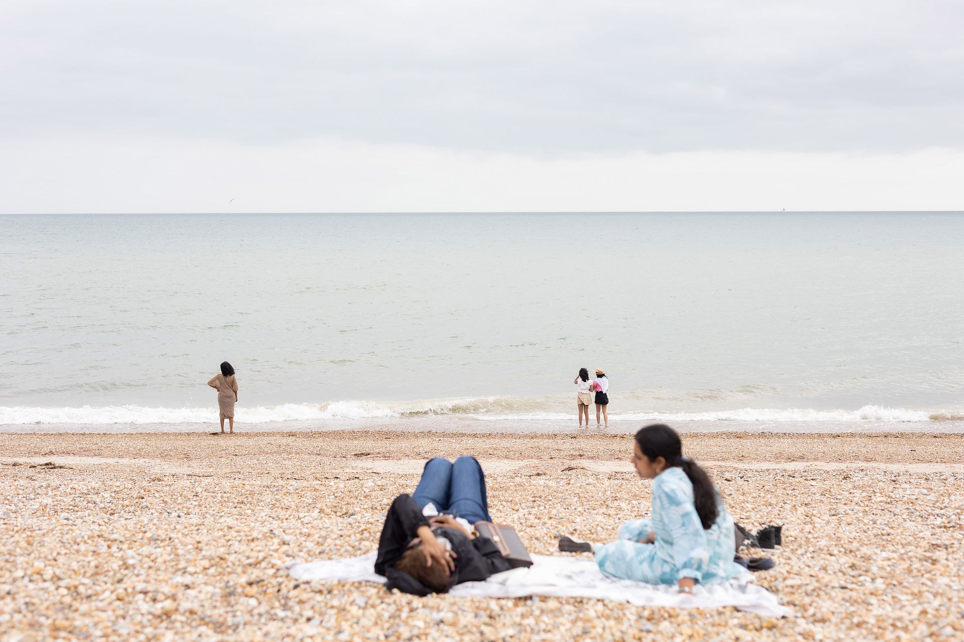 A view from the pier of Bognor Regis beach at low tide., across the shingle to the Esplanade.