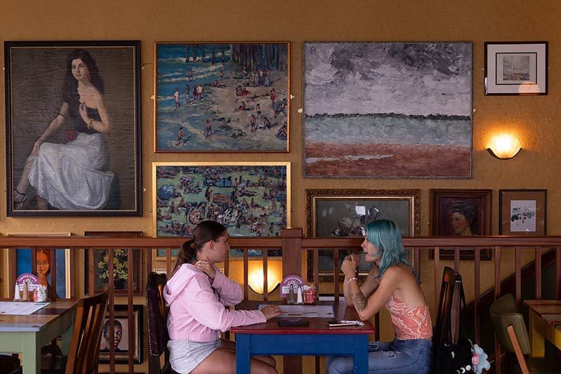 The busy High Street of Bognor Regis with Christmas Shoppers and decorations.