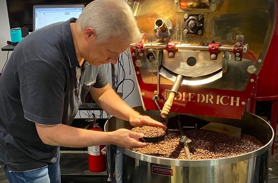 Brian Redpath roasting coffee beans