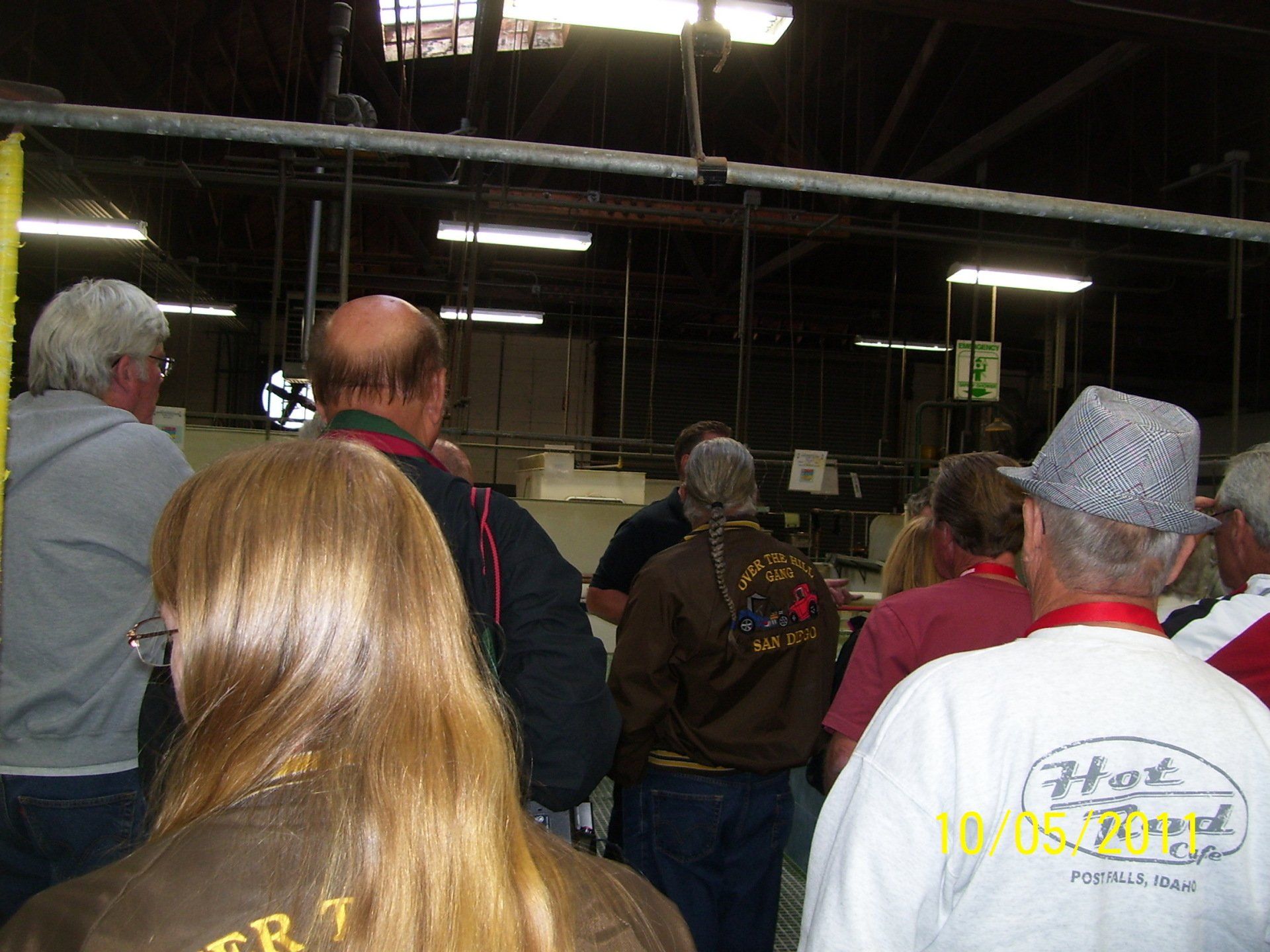 A group of people wearing shirts that say hot rod