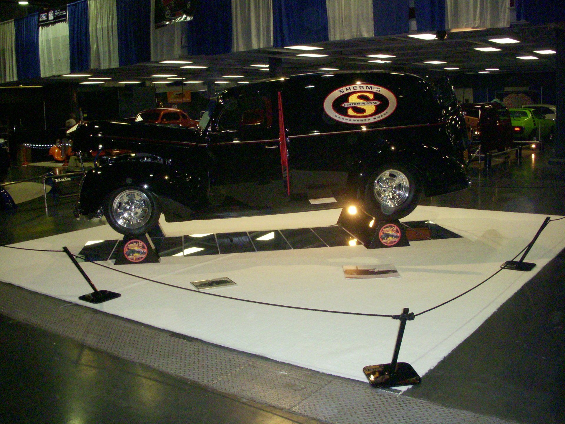 A black van with the letter s on it