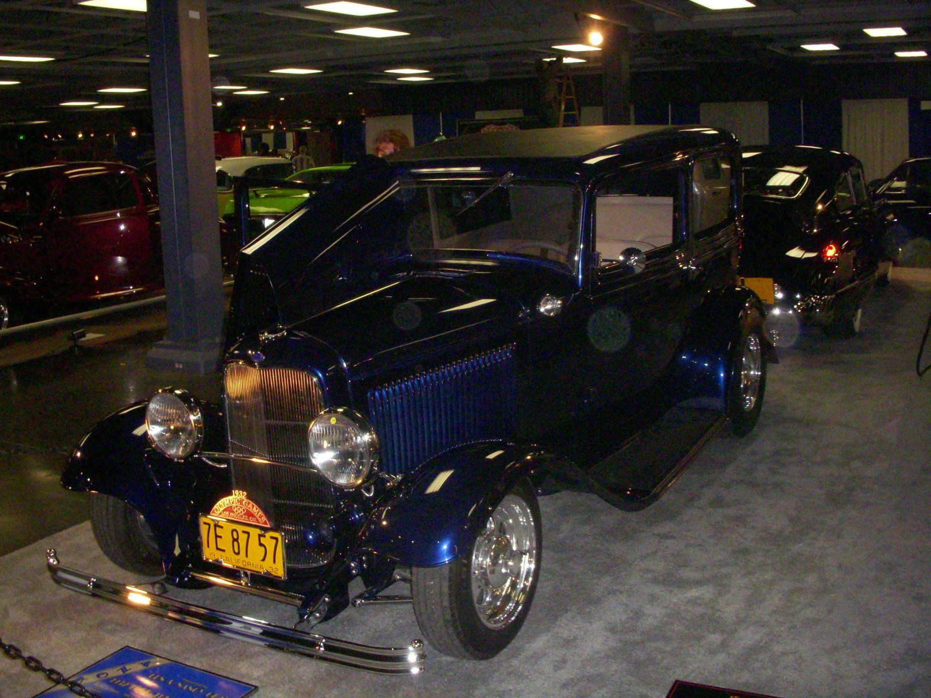 A blue car with a license plate that says te 87 91