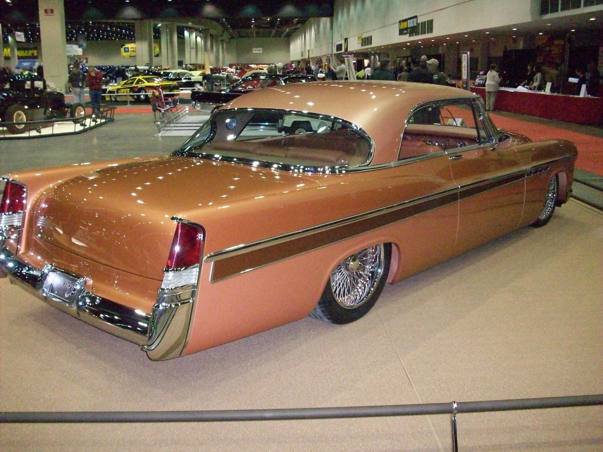 A classic car is on display at a car show