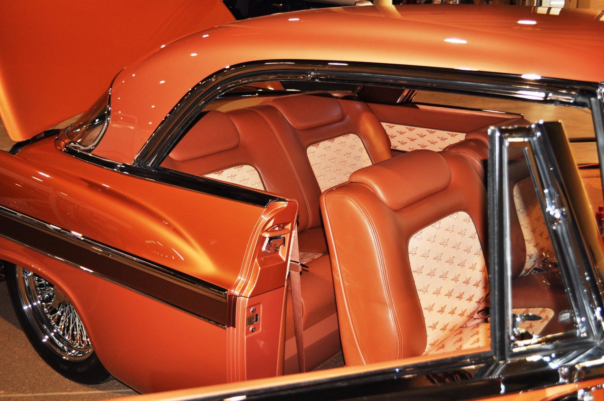 The inside of a car with the hood open