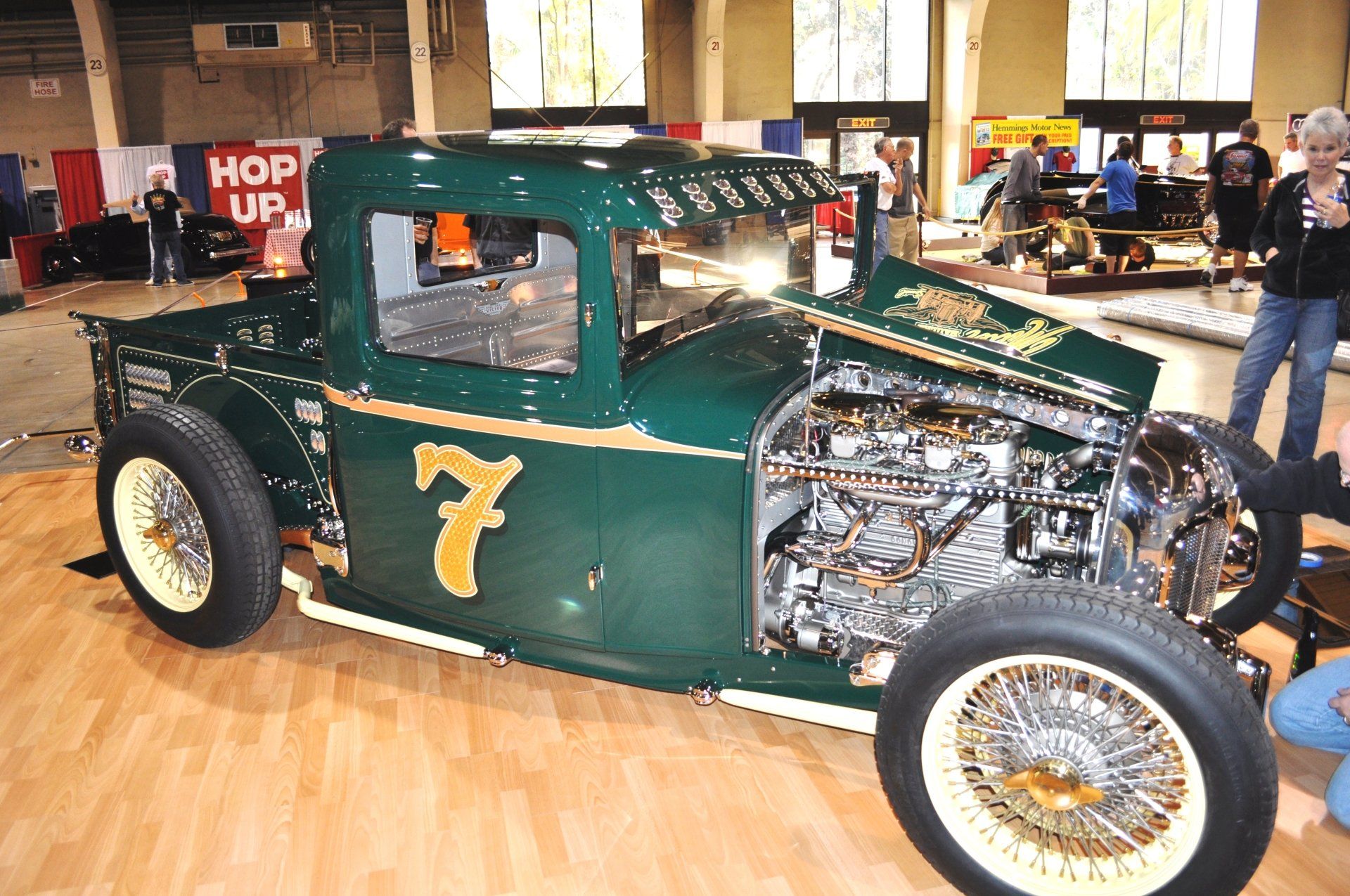 A green car with the number 7 on it