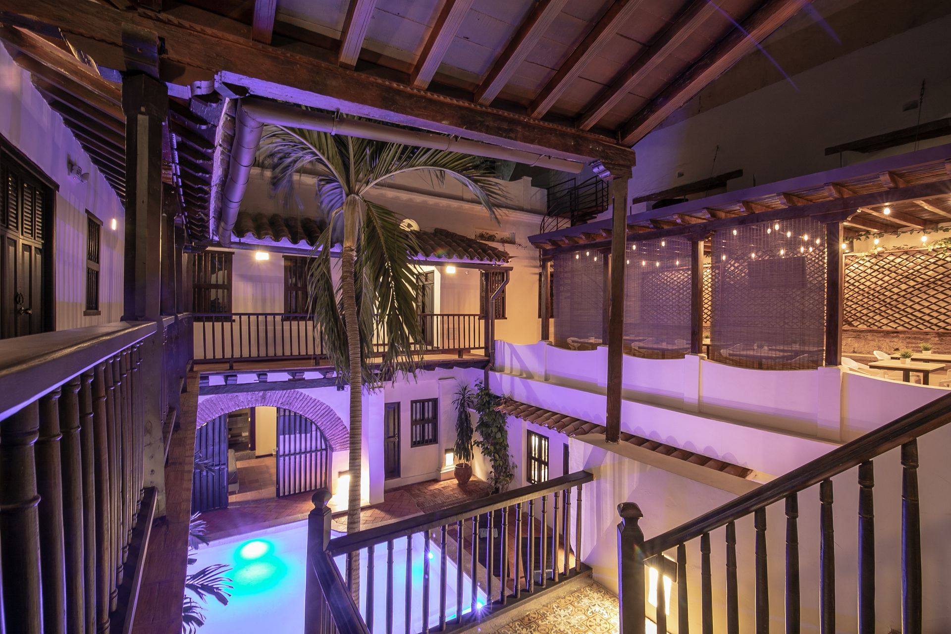 There is a swimming pool in the middle of the building.