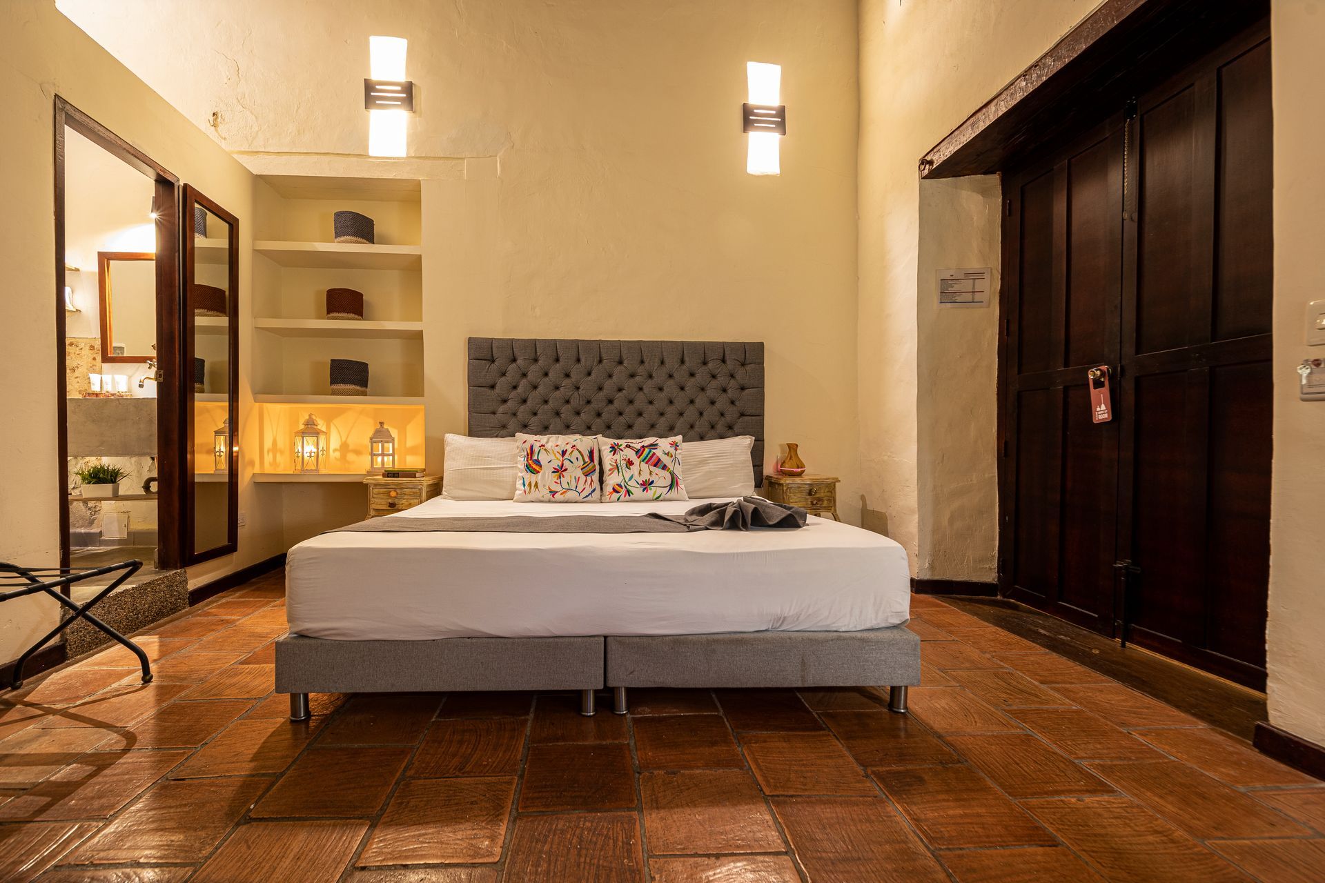 There is a large bed in the middle of the room.