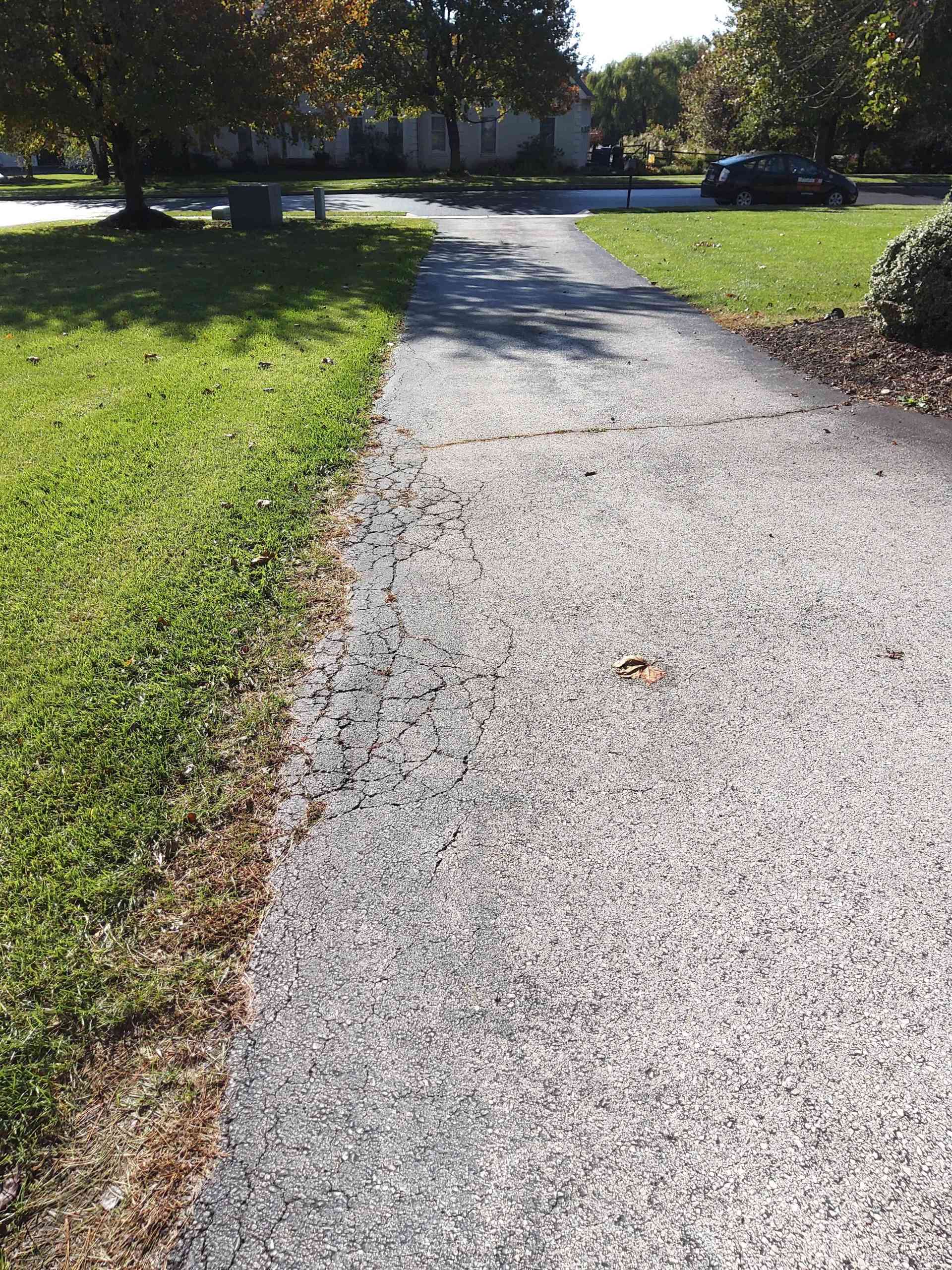 before driveway patching image ten
