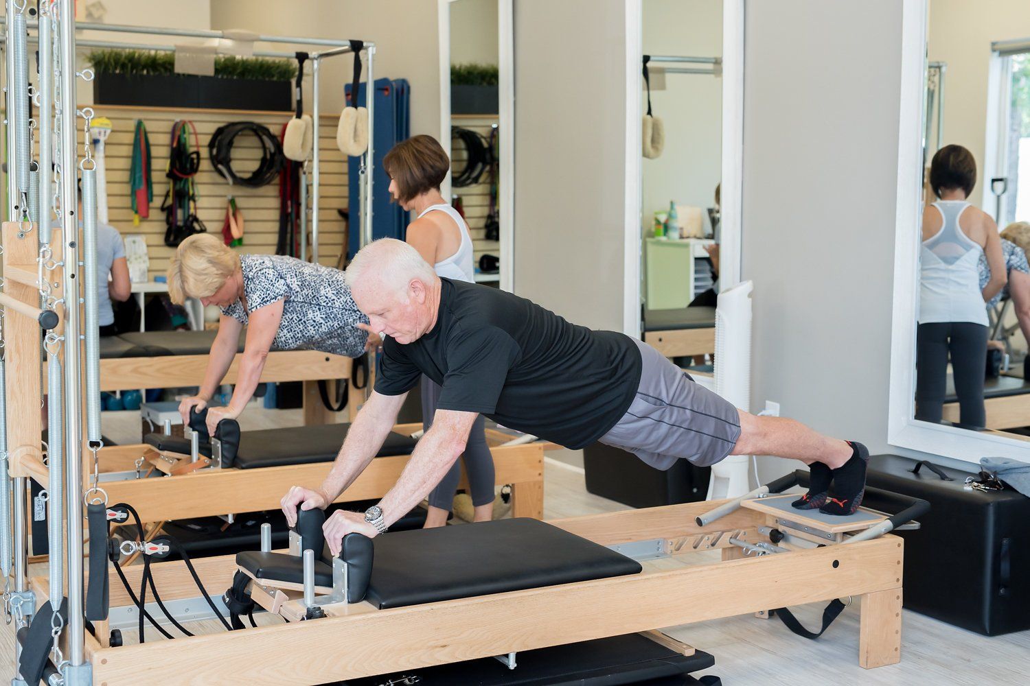 Energi Pilates 2 clients training at studio