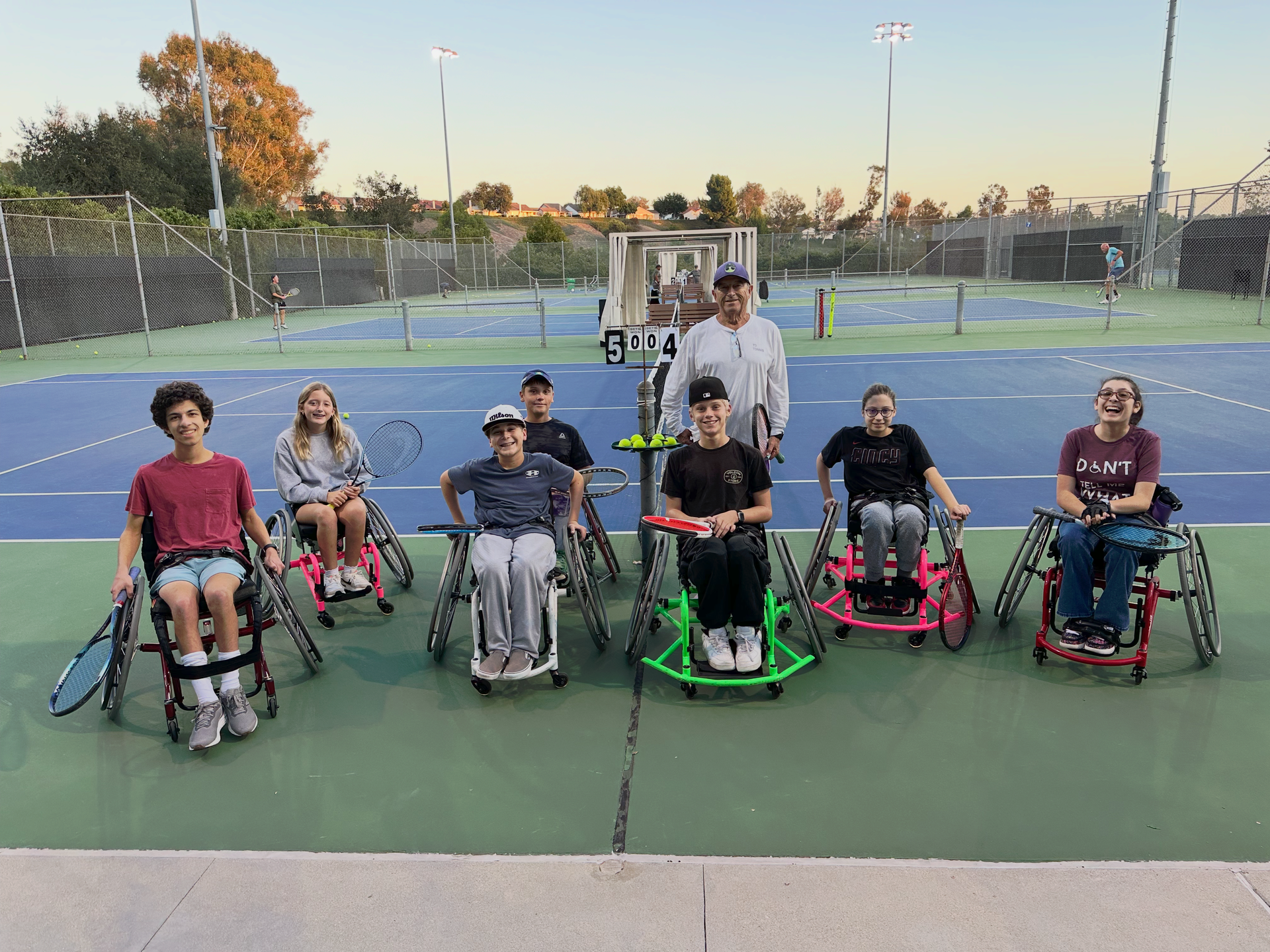 T3 Adaptive Racquet Sports Thursday group practicing on the court