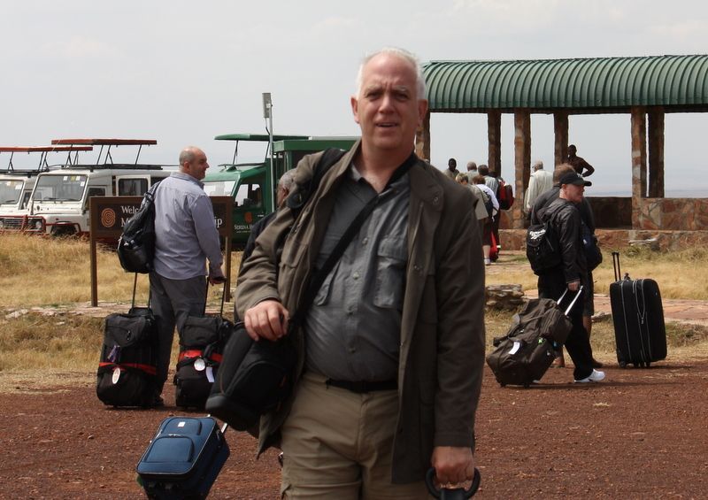 A gray mountain with a circle in the middle on a white background.