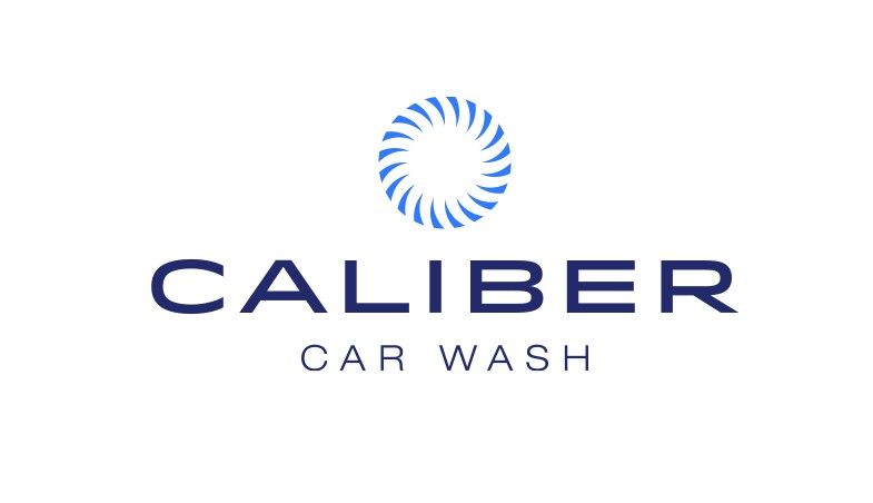 Caliber Car Wash logo: blue text and symbol on white background.
