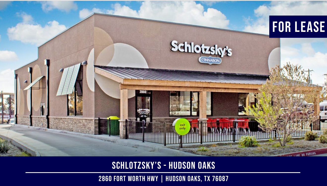 Schlotzsky's building for lease in Hudson Oaks, TX. Tan and stone exterior, "For Lease" text.