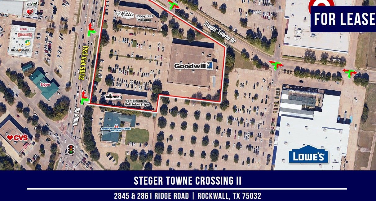 Aerial view of Steger Tomme Crossing II retail area in Rockwall, TX, outlined in red, with parking and adjacent Lowe's. 