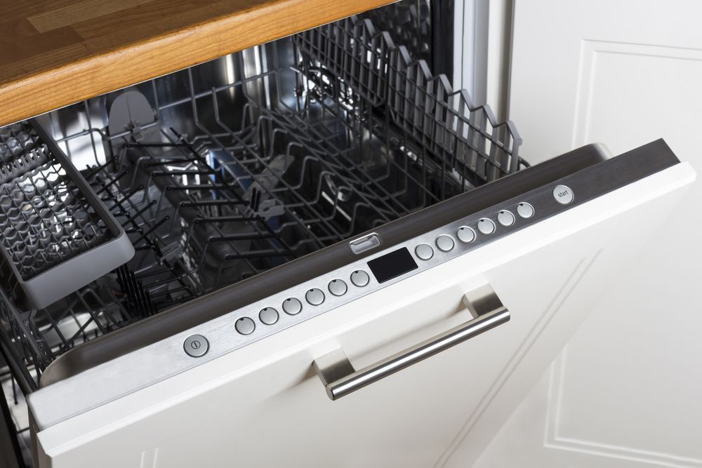 Open White Dishwasher With a Top-mounted Metal Control Panel — Eurocoast Appliance Service In Woy Woy, NSW