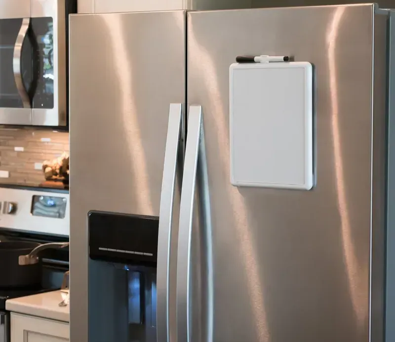 Blank Magnetic Whiteboard With a Marker Attached — Eurocoast Appliance Service In Tuggerah, NSW