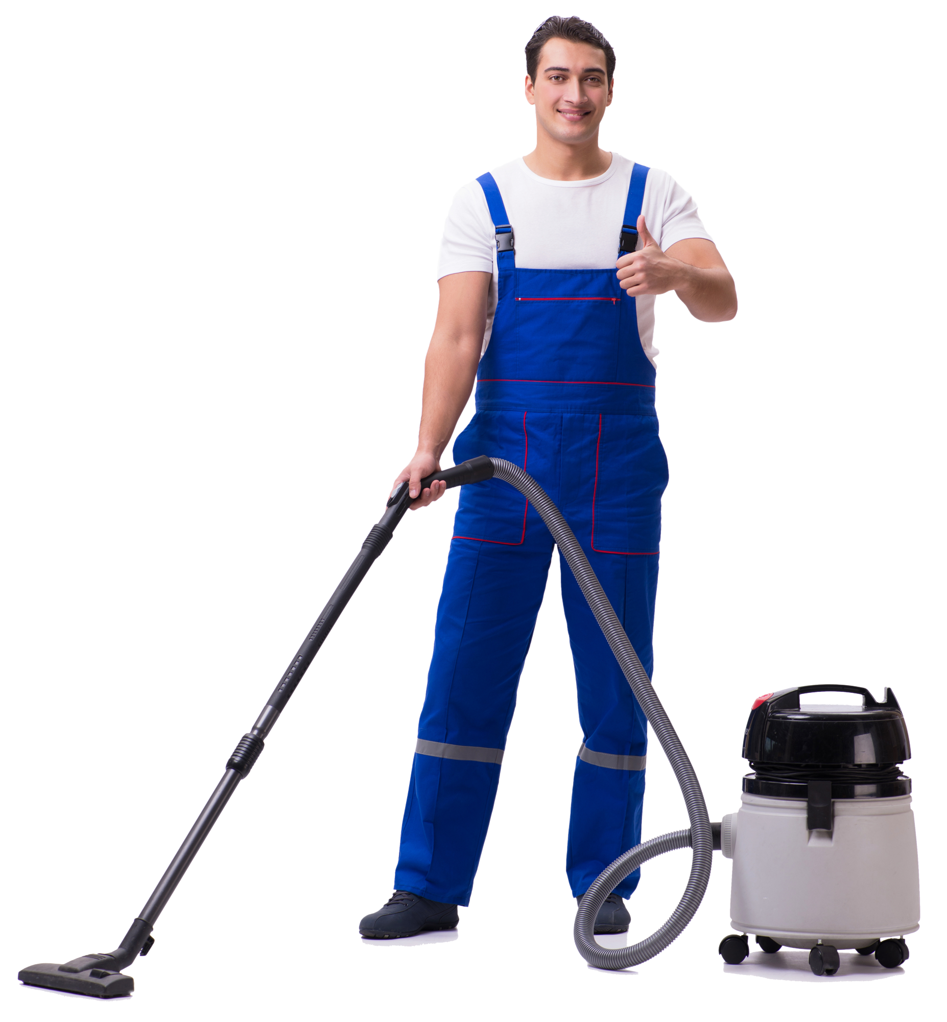 A man in blue overalls is using a vacuum cleaner.