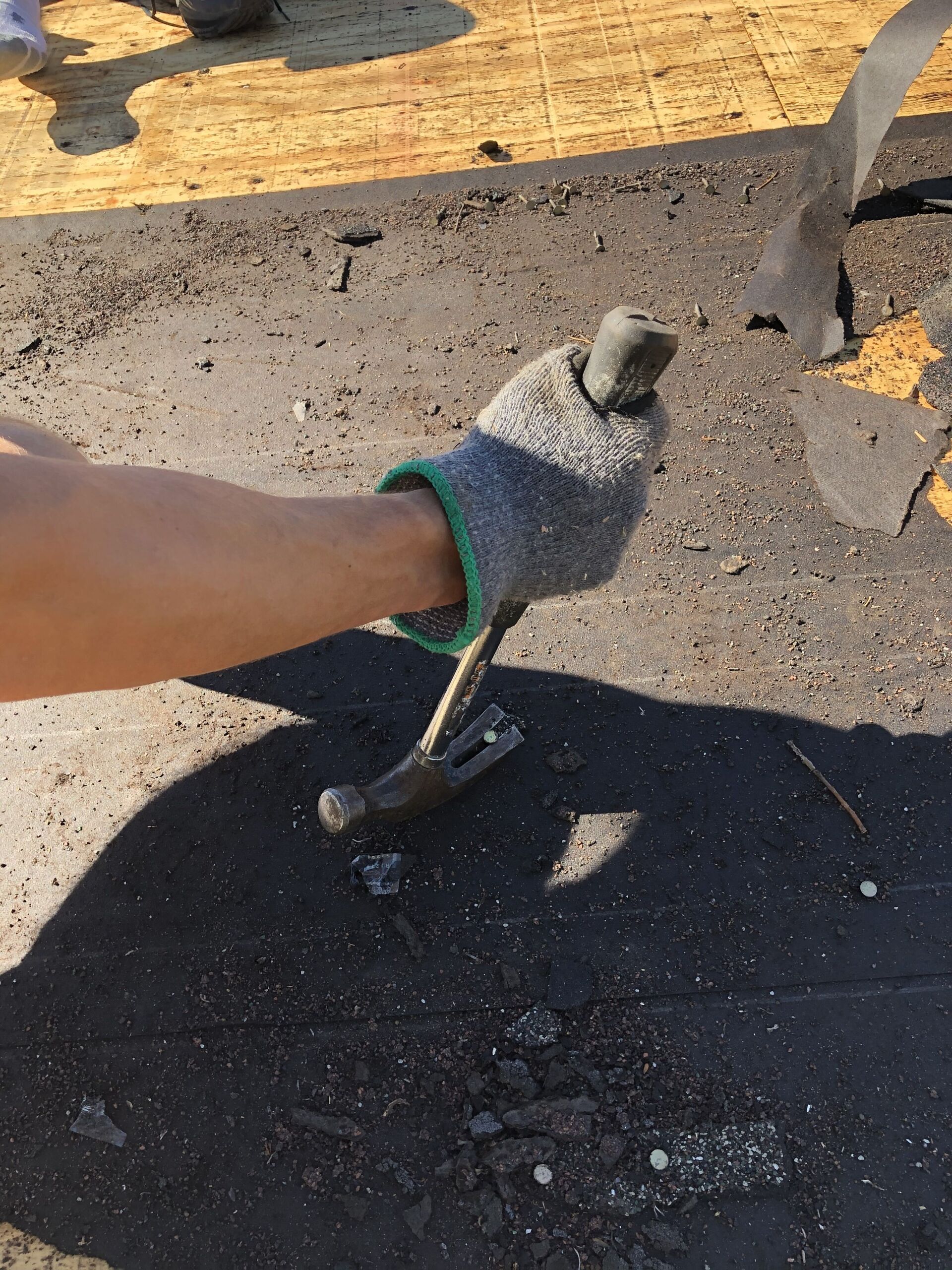 Taking out nails from roof