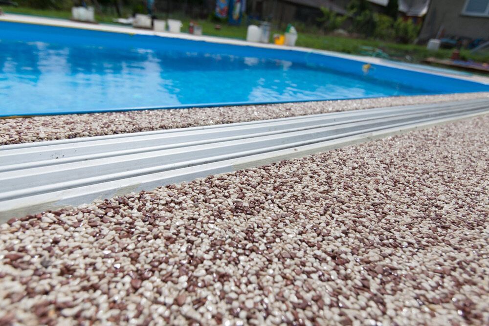 Exposed Aggregate Pool Surrounds — Tiga's Concreting Services In Branyan, QLD