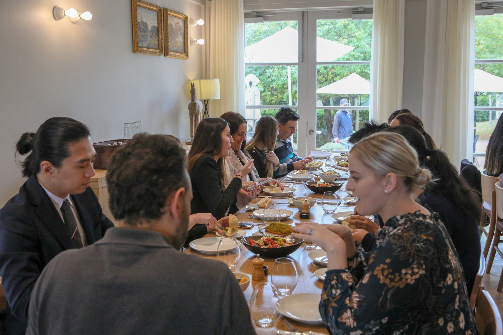 A group of people enjoying dinner at Luxury CPD