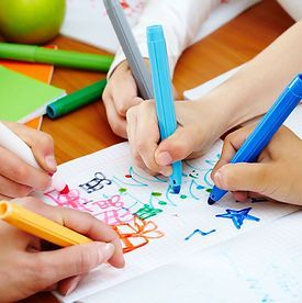 children drawing together