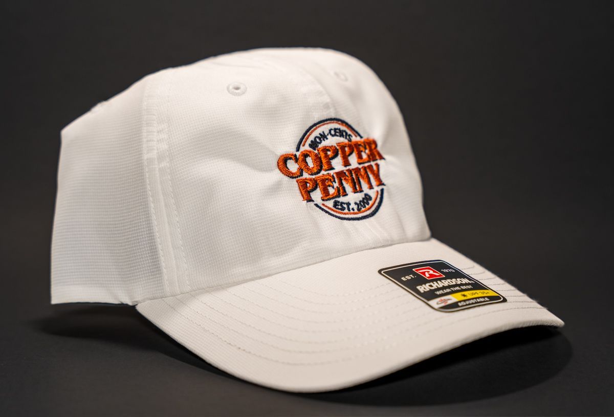 White baseball cap with the Copper Penny logo.