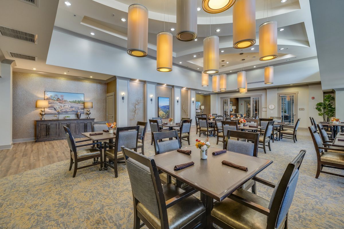 A large dining room filled with tables and chairs.