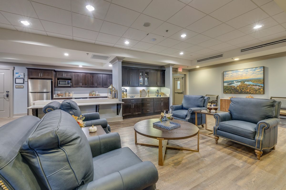 A living room filled with furniture and a coffee table.